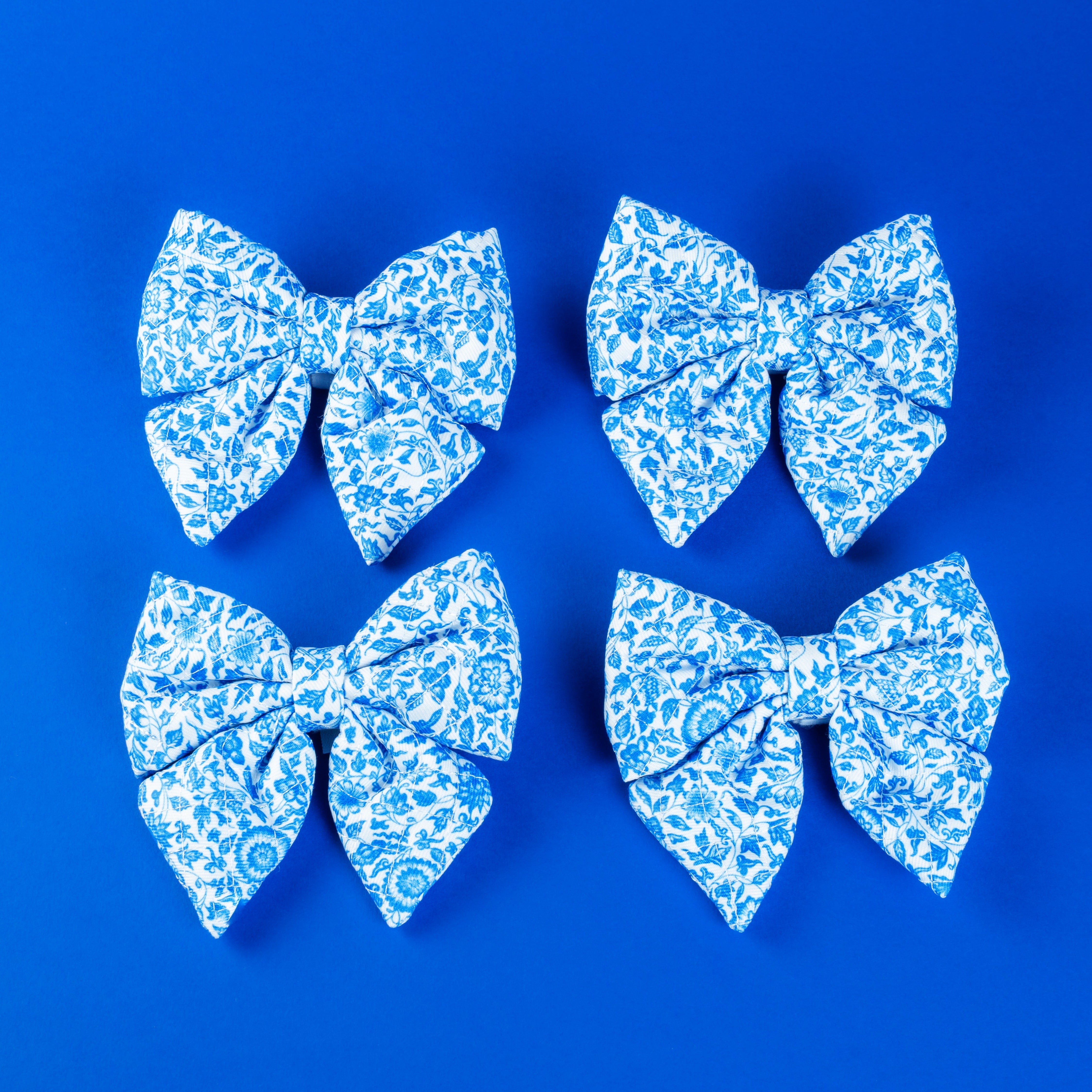 Blue floral dog bows for stylish puppy accessories