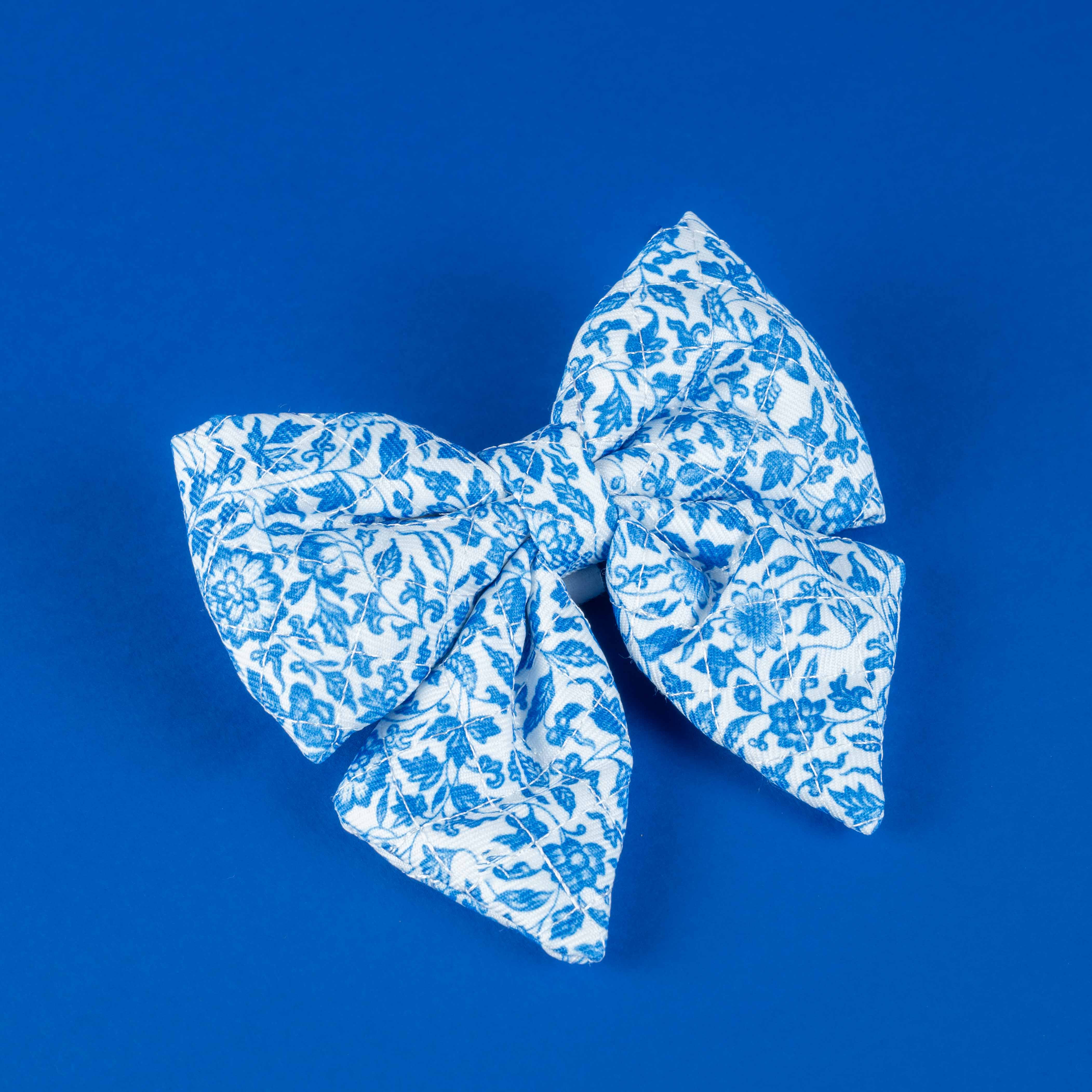 Blue and white floral patterned dog bow tie for small dogs, stylish pet accessory