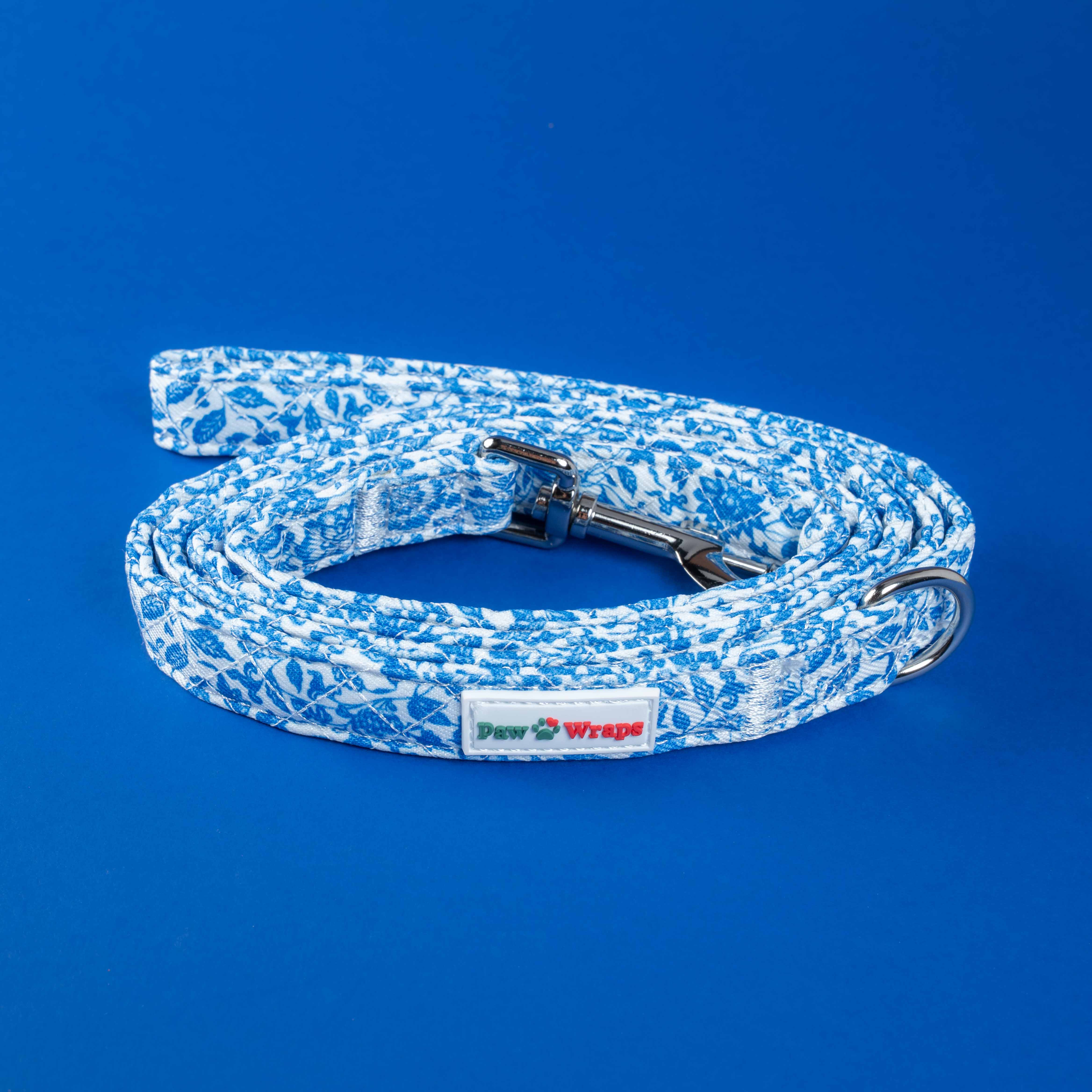 Blue floral print dog lead with Paw Wraps tag, stylish accessory for small dogs