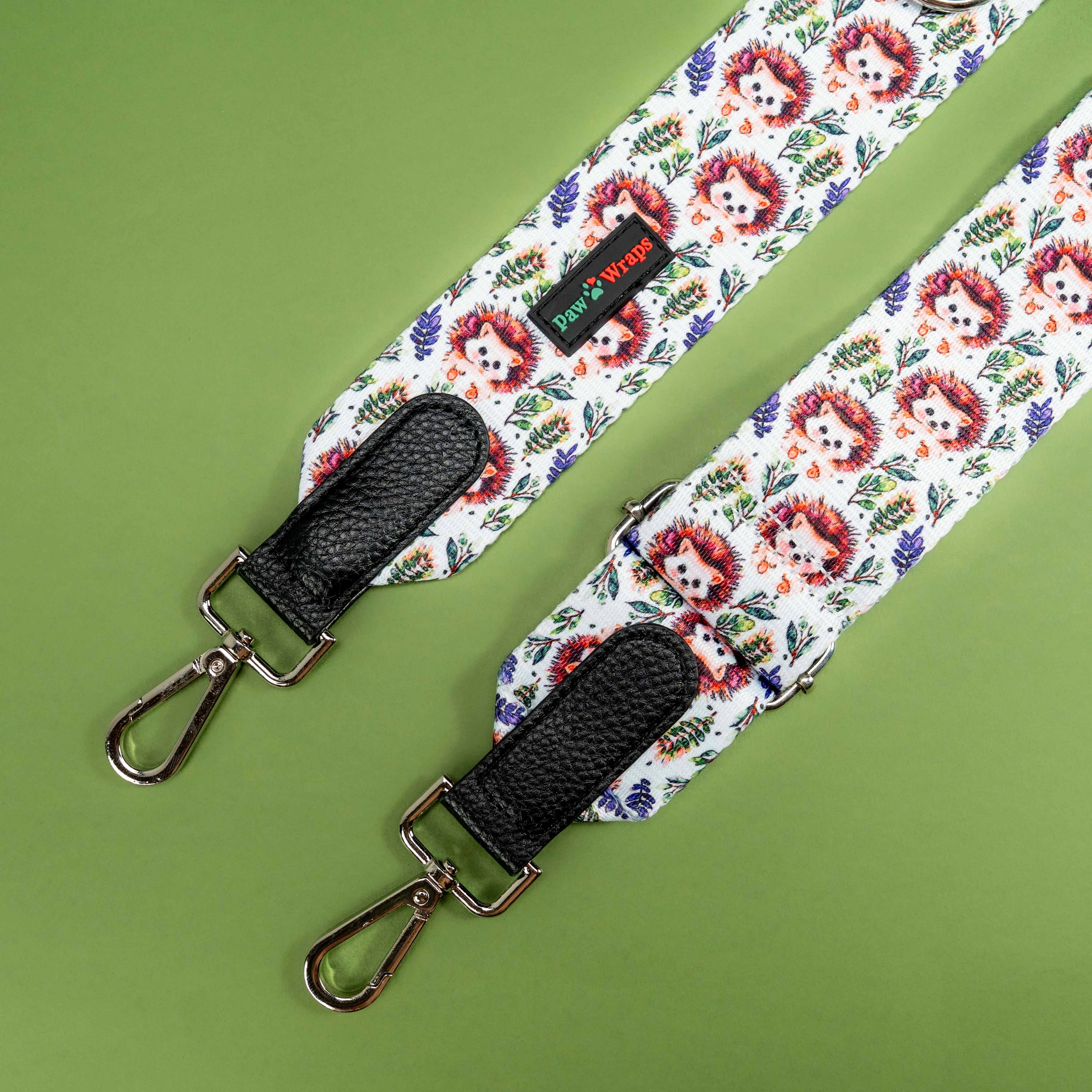 Cute hedgehog print dog lead with black grip and metal clasp on green background
