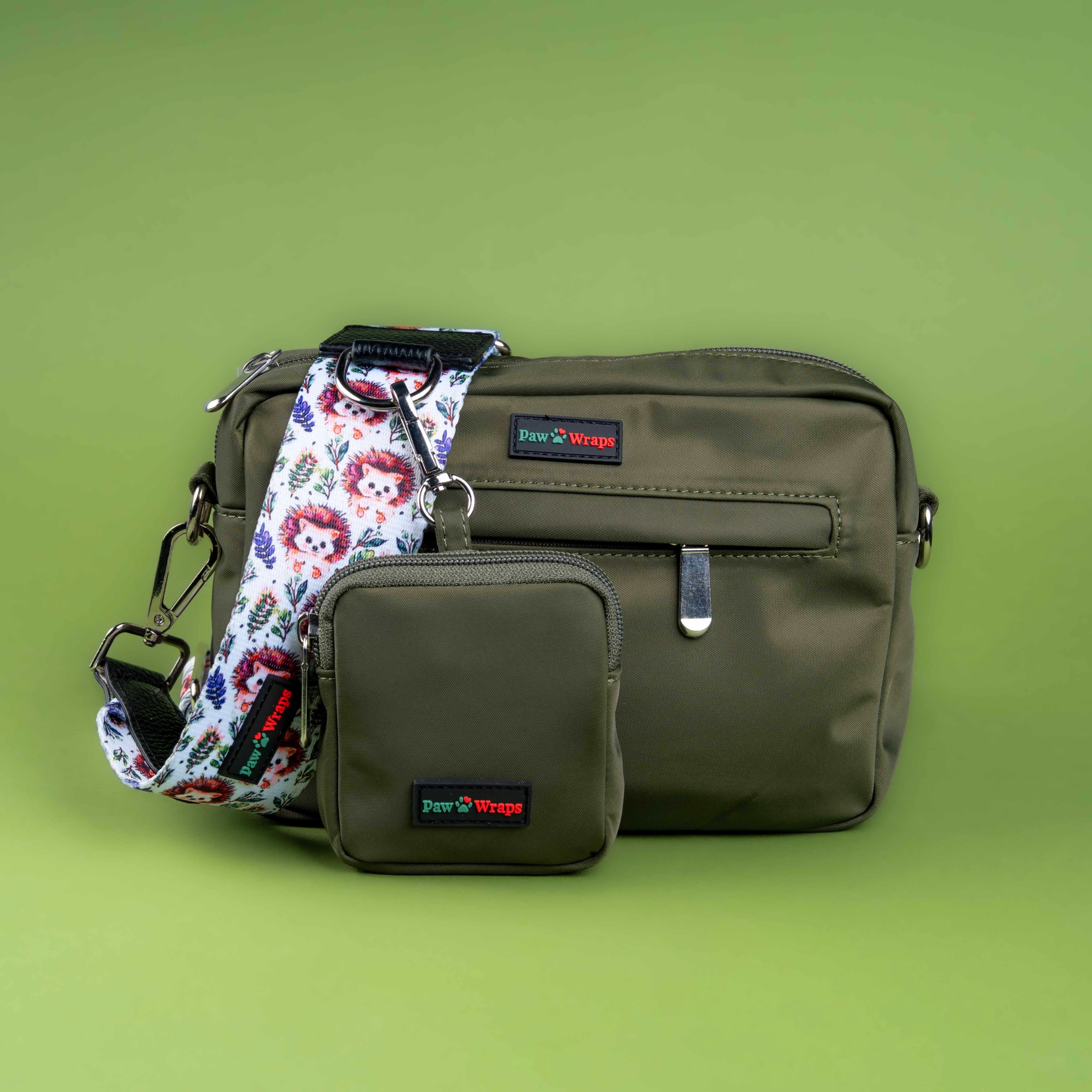 Olive green dog walking bag with floral hedgehog strap, matching pouch, and Paw Wraps branding.