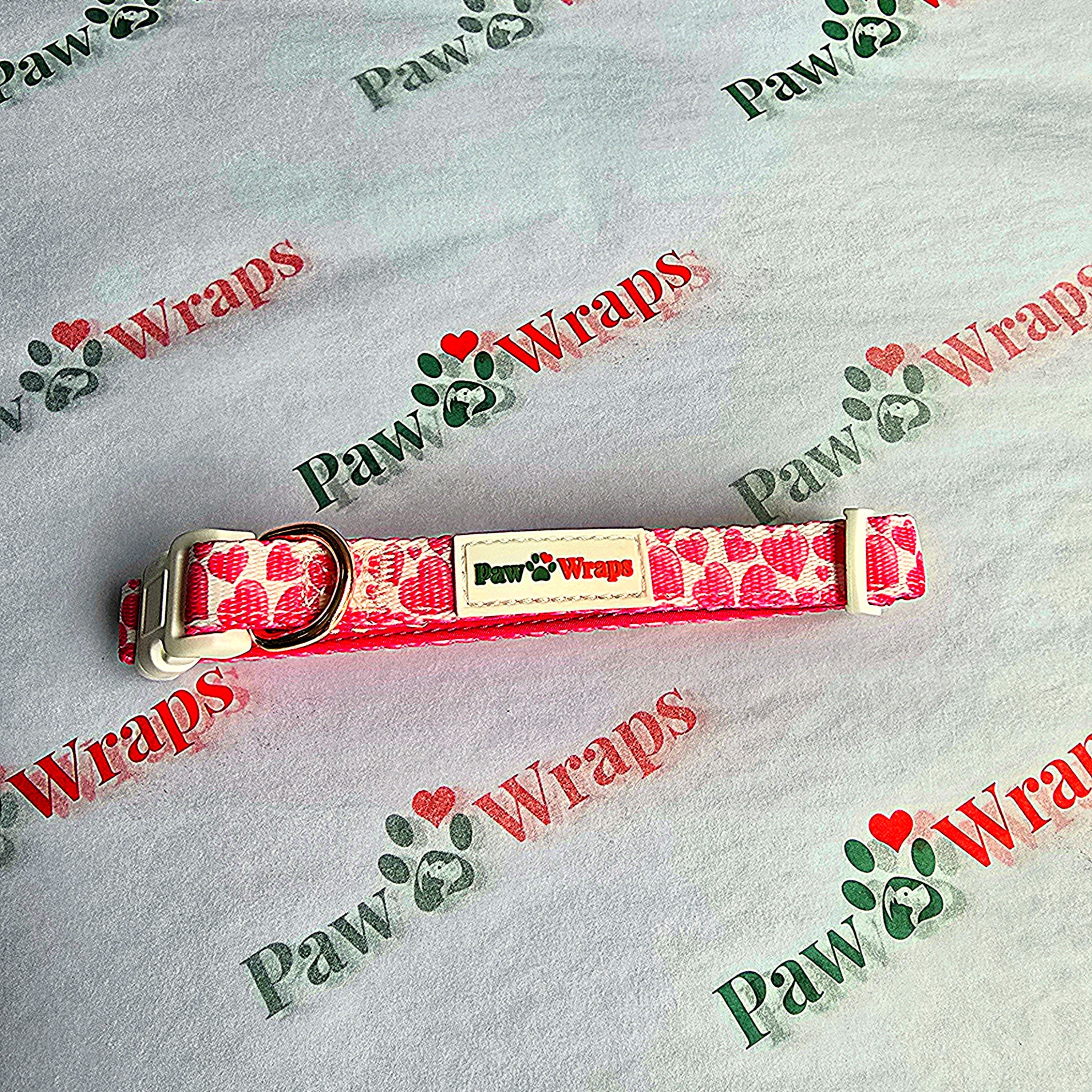 Red heart print dog collar with Paw Wraps label on branded fabric background