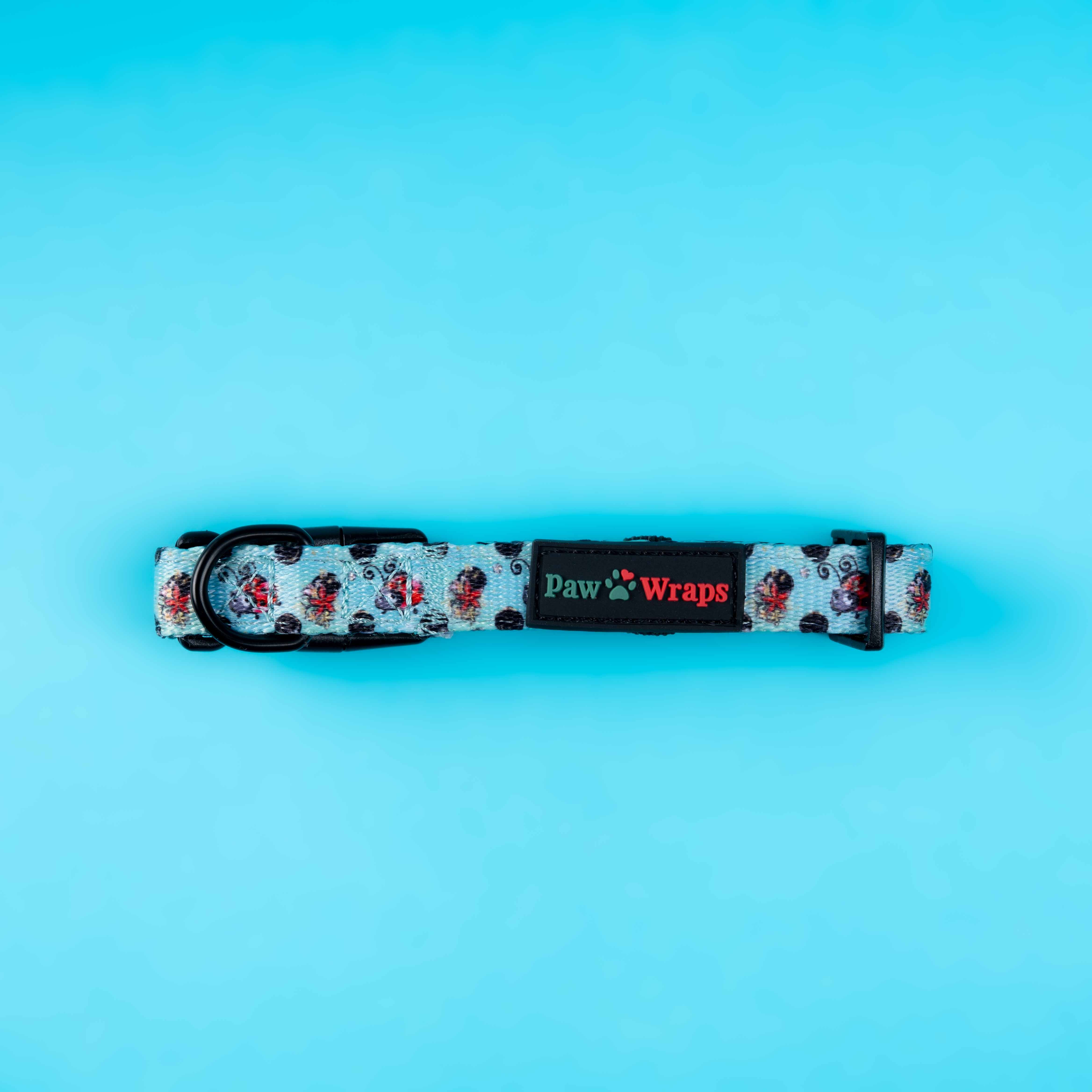 Stylish floral dog collar with Paw Wraps branding, perfect for luxury small dog accessories.